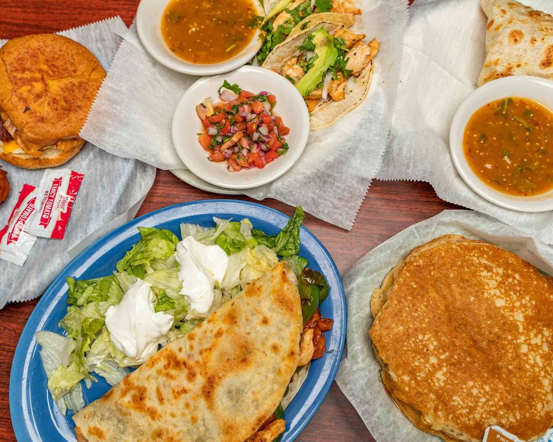 Guac Fresh Mex signature dishes Fajita NachosGuac BowlQuesadillas